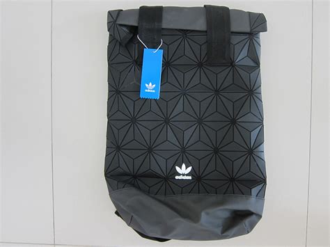 adidas 3d roll top backpack real vs fake|adidas counterfeit or real.